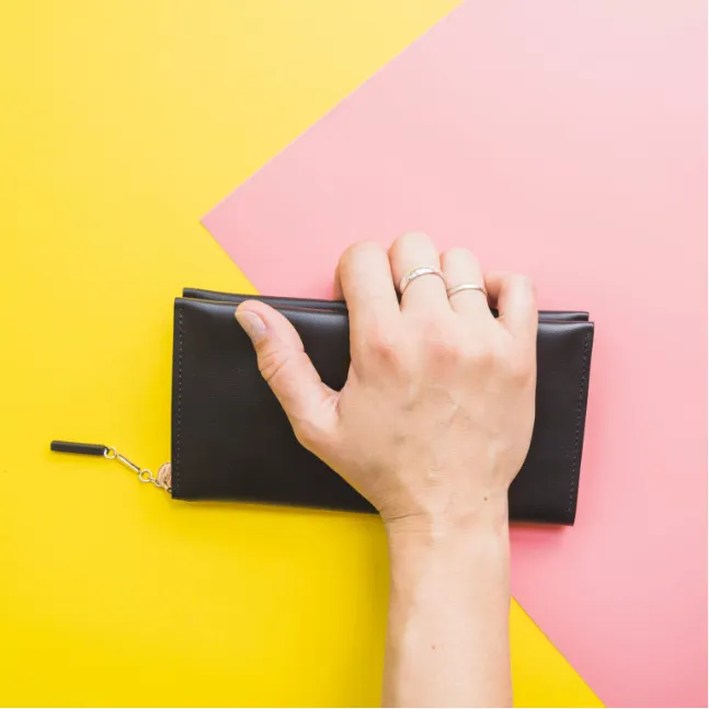 woman hand with clutch bag